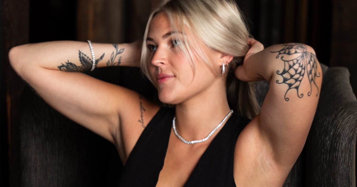 women in black dress with a lab grown diamonds  necklace 