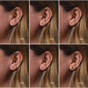 Polished 14K gold ball stud earrings shown on ear in six sizes