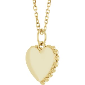Engravable heart necklace in 14K yellow gold, angled view