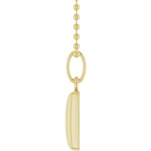 Engravable puffed dog tag necklace in 14K yellow gold, side profile