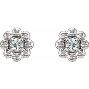 April 0.06 CTW Natural Diamond Petite Flower Birthstone Stud Earrings pair view in 14K white gold