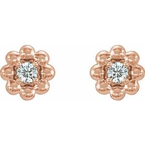 April 0.06 CTW Natural Diamond Petite Flower Birthstone Stud Earrings pair view in 14K rose gold