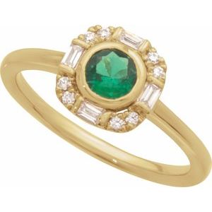 Natural emerald and diamond halo ring alternate angle in 14K yellow gold