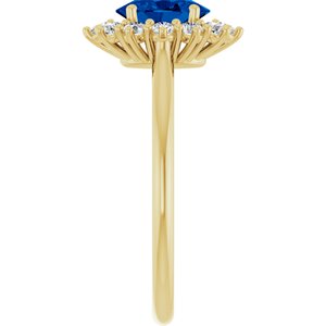 Oval lab-grown blue sapphire and diamond halo ring side profile in 14K yellow gold