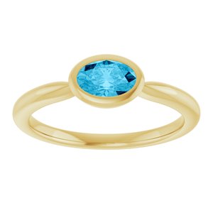 Oval Natural Aquamarine Bezel Solitaire Ring three-quarter view in 14K yellow gold