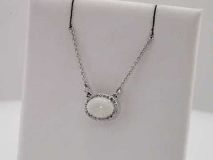 Natural white opal and diamond halo necklace in 14K white gold video