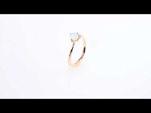 Ethiopian opal and diamond bypass ring rotating product video